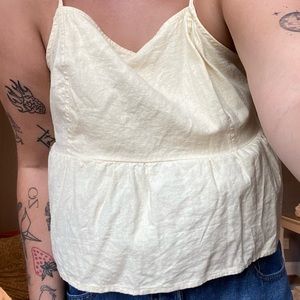 Cropped pastel yellow babydoll style top